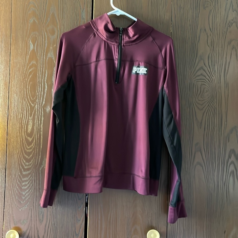 Pink long sleeved maroon/ black pullover. Size Large
